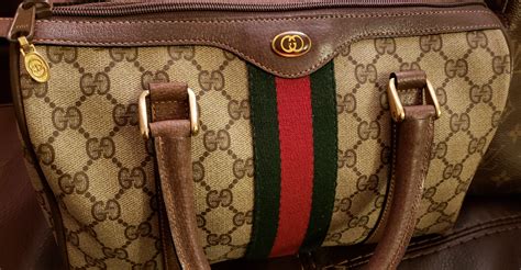 how do i know if my gucci bag is real|gucci purse real.